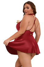 Plus size PU leather nightgown in red with adjustable straps and flared hem for a flattering fit
