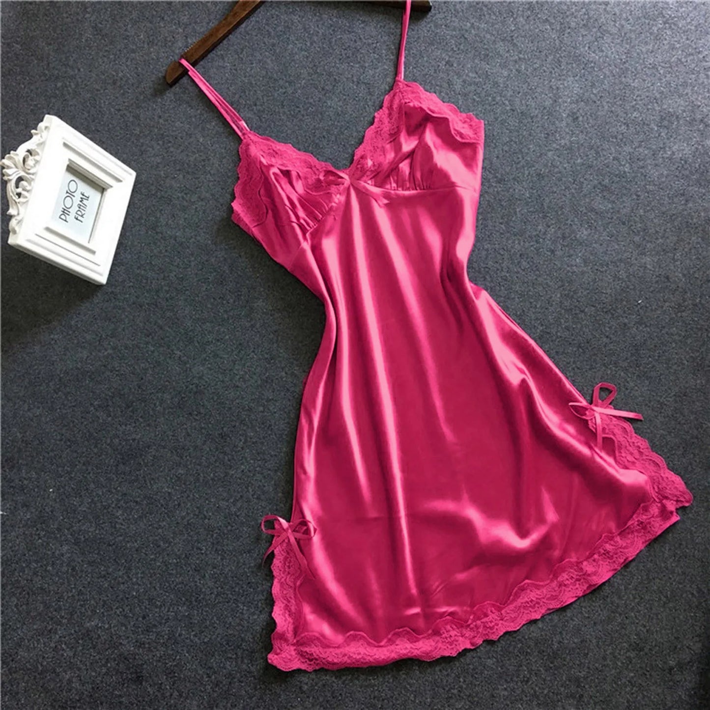 Luxurious pink plus size satin chemise nightgown with lace trim and adjustable straps
