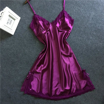 Elegant plus size satin chemise nightgown in rich purple with lace trim and adjustable straps