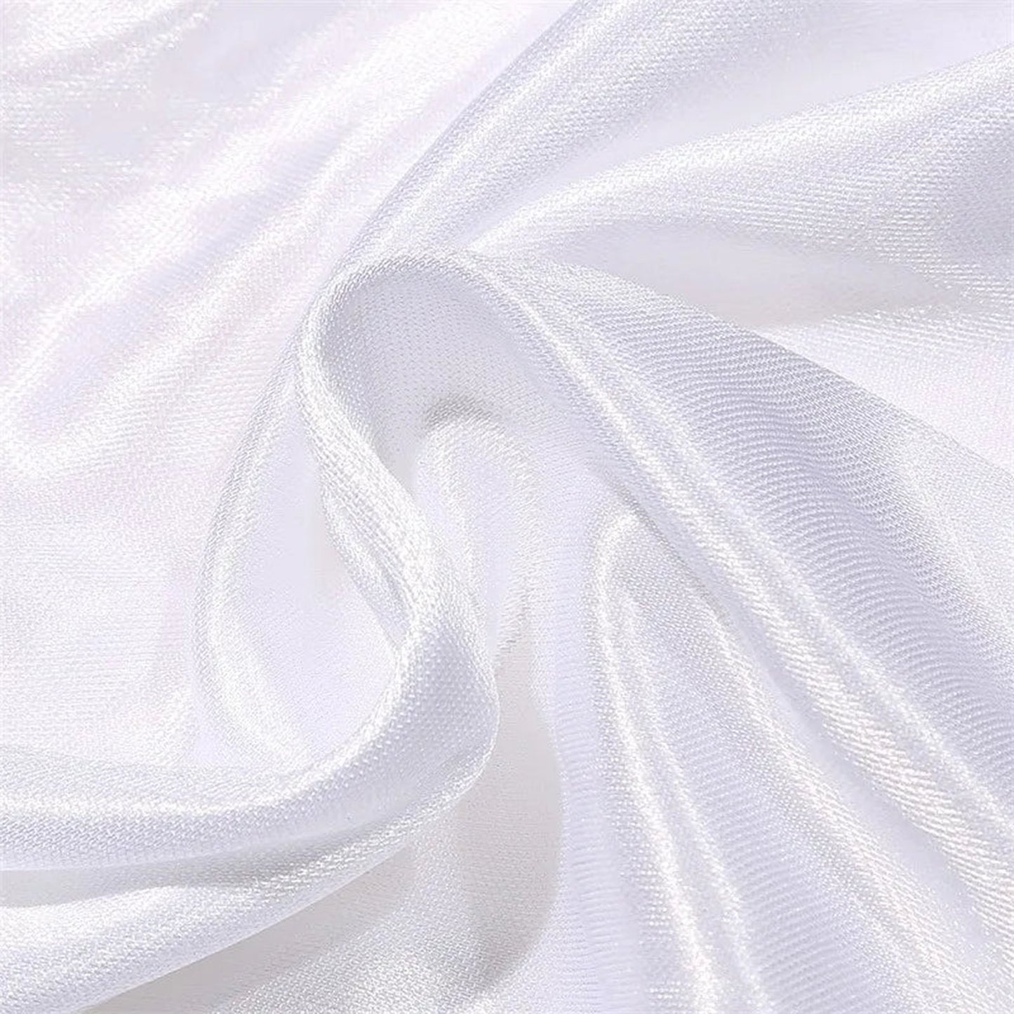 Close-up of soft white fabric showcasing the luxurious texture of plus size satin lingerie nightgown