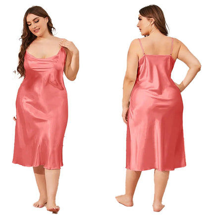 Plus size satin nightgown for women in soft peach hue with adjustable spaghetti straps