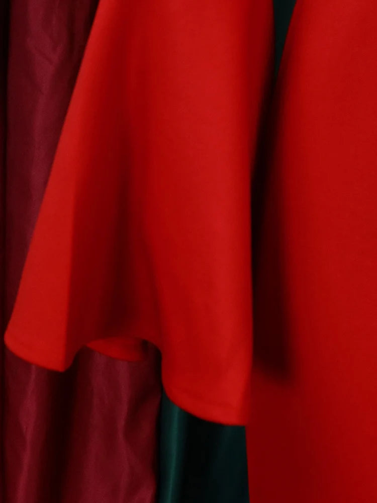 Close-up of red fabric showing an A-Line plus size sexy party dress for women by LuckeLadybug LLC