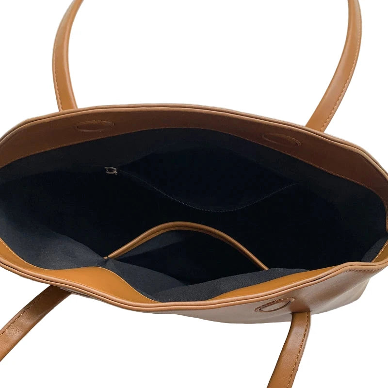 Interior view of a PU baguette shoulder bag for women with spacious compartments and sleek design