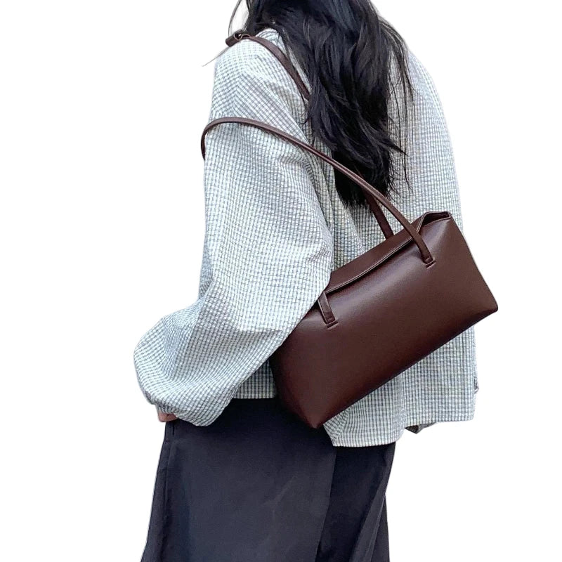 Elegant brown PU baguette shoulder bag for women, perfect for casual outings and stylish occasions