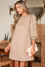 Beige puff sleeve dress by LuckeLadybug LLC with a relaxed fit and elegant design
