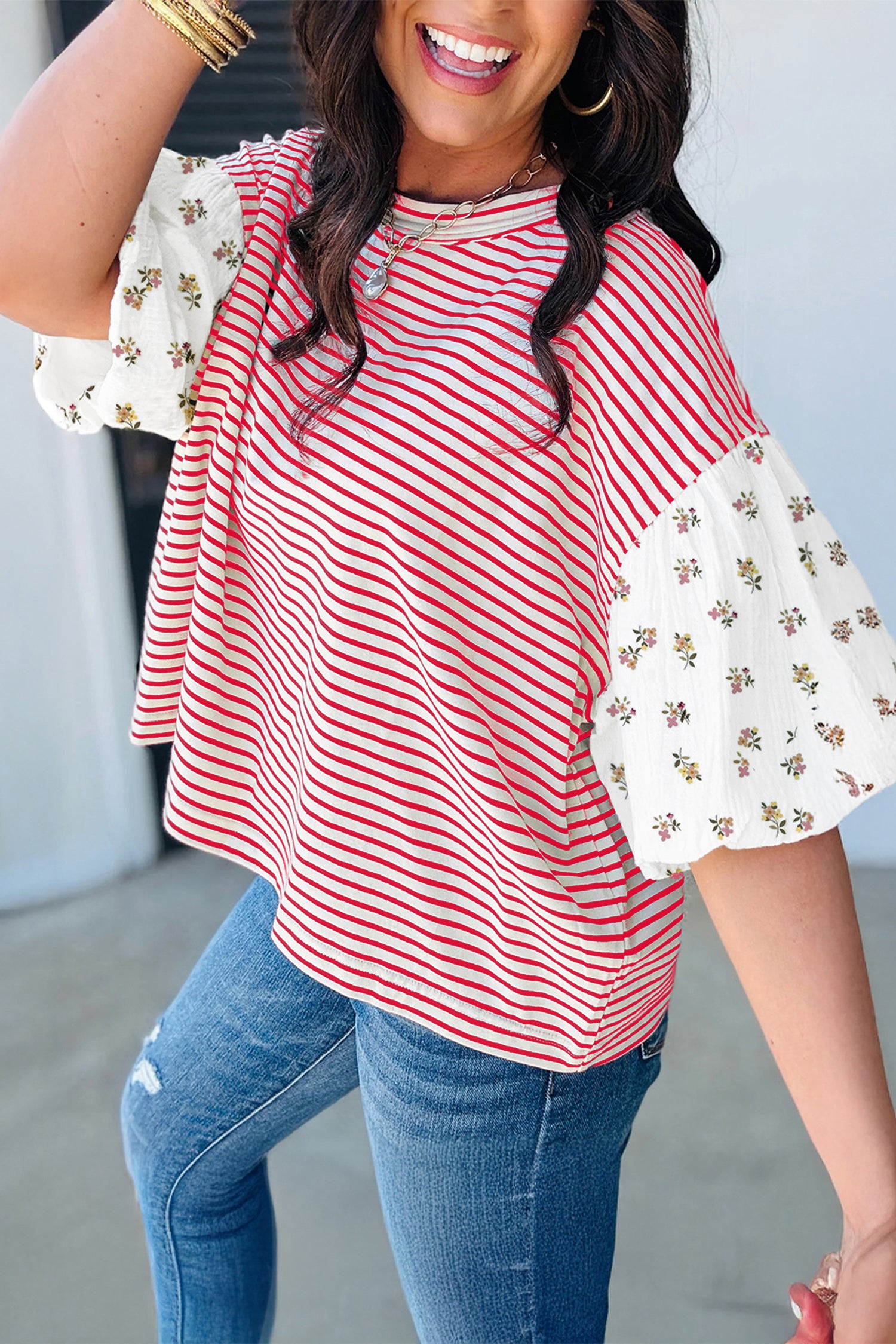 LuckeLadybug LLC puff sleeve dress featuring striped pattern with floral accents on sleeves