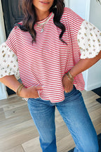 Casual striped blouse with puff sleeves, perfect for pairing with jeans or shorts in any season