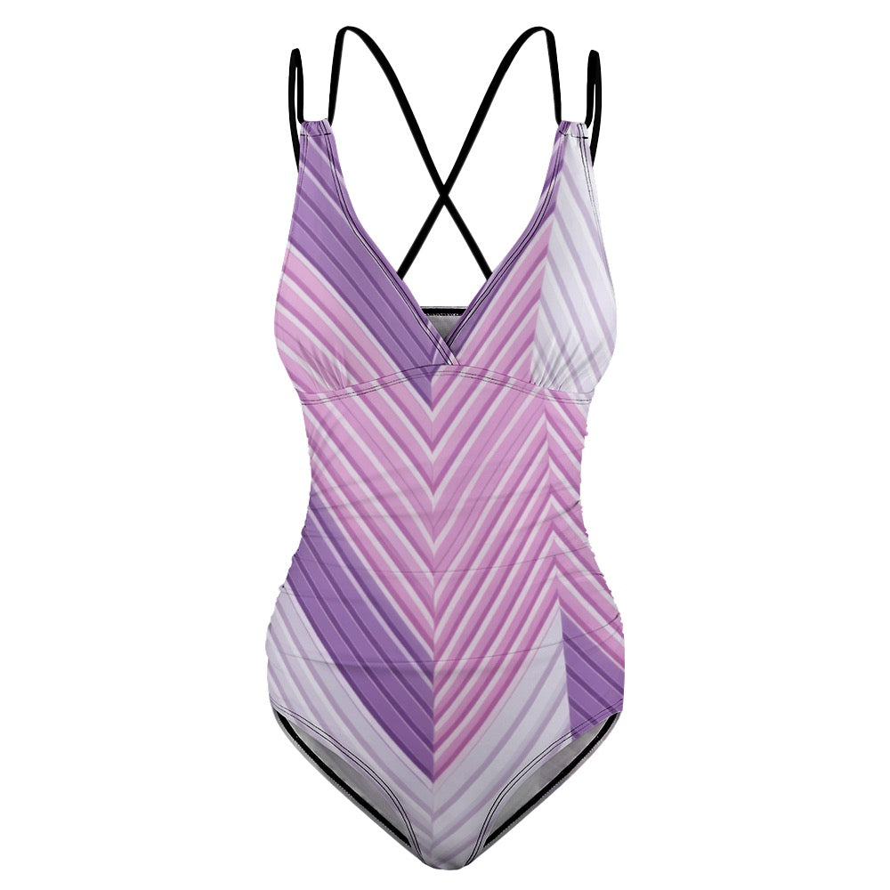 Luckeladybug purple zig zag swimsuit one-piece with crisscross black straps and V-neck design