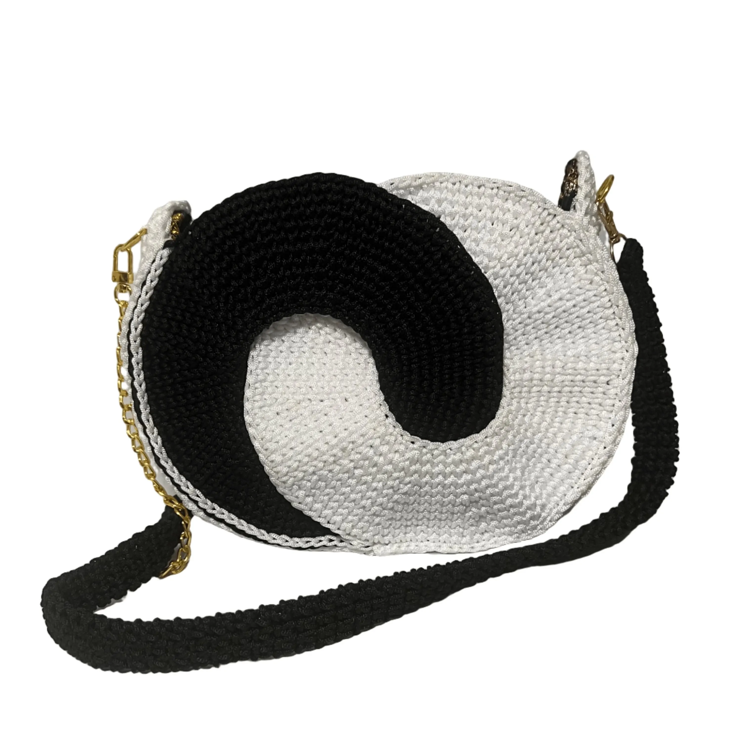 Unique black and white crochet purse with spiral design by ThreadsByHannah for stylish outings