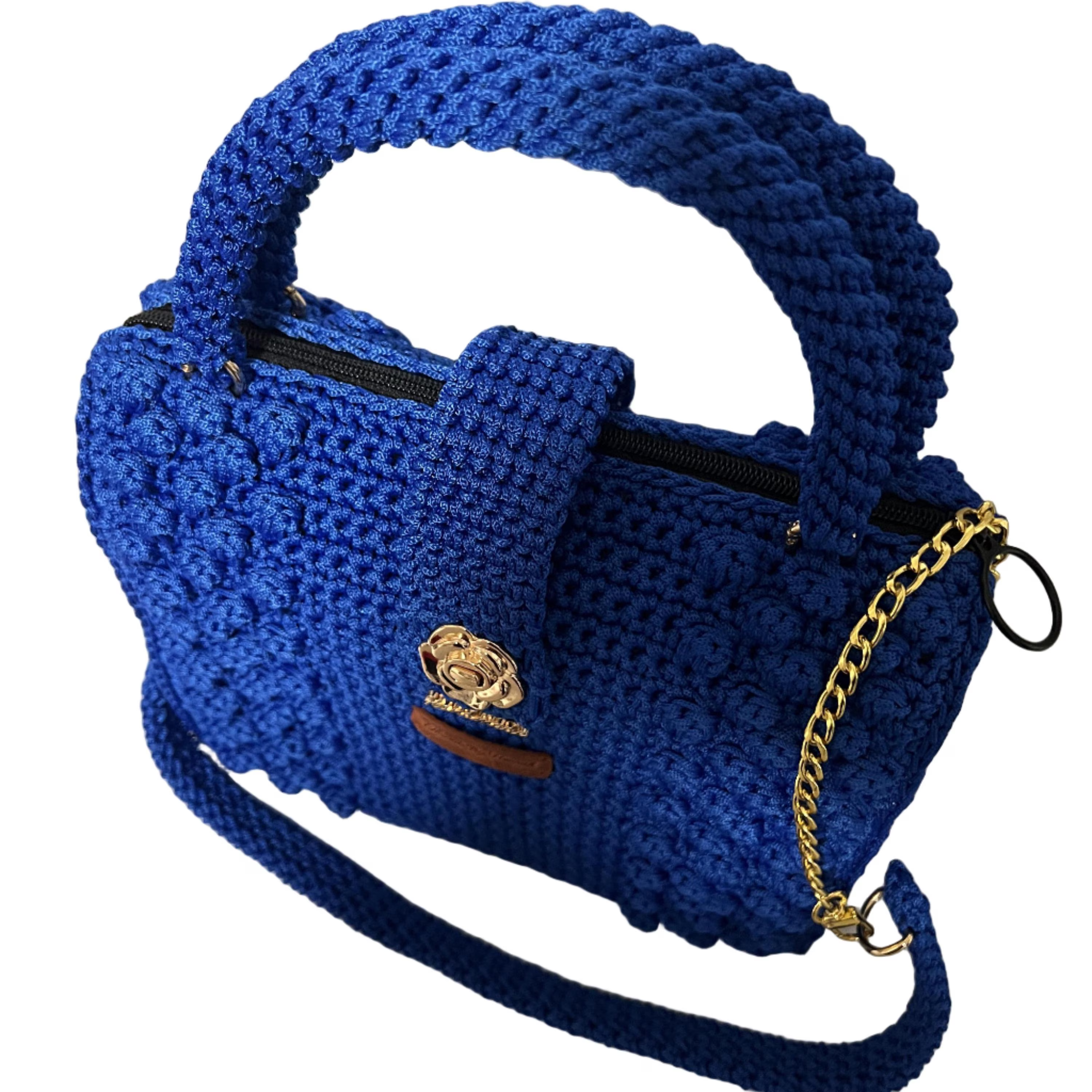 Blue crochet purse with a top handle and gold chain detail for stylish outings
