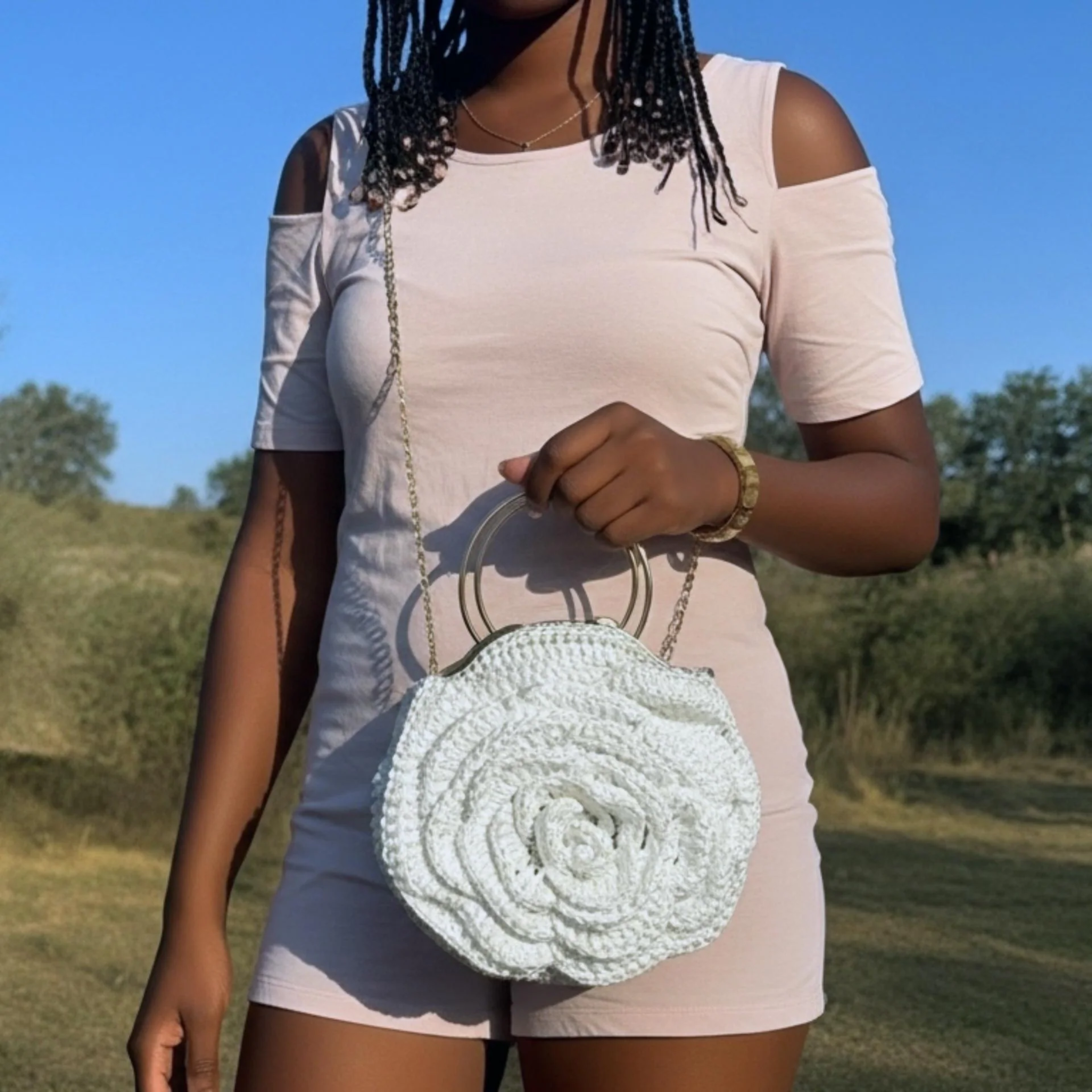 ThreadsByHannah purse crochet with a floral design and chain strap, perfect for stylish outings