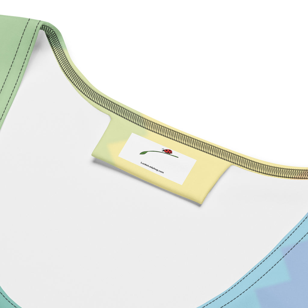 Close-up of the neckline of a LuckeLadybug rainbow bodycon dress featuring a soft fabric design