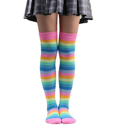 Colorful LuckeLadybug rainbow knee high socks for women in pastel stripes, perfect for fun, trendy outfits
