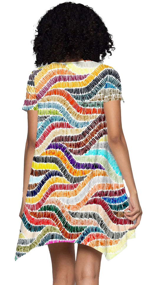 Back view of a woman wearing a rainbow wave print mini dress with colorful wave patterns