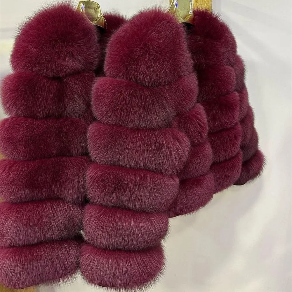 Luxurious real fox fur coat womens in deep burgundy color featuring a plush design