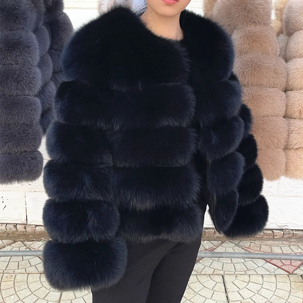 Luxurious real fox fur coat womens in navy blue with plush texture and elegant design.
