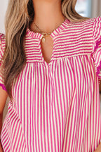 Stylish red and white striped blouse with a keyhole neckline and ruffled sleeves for a casual look