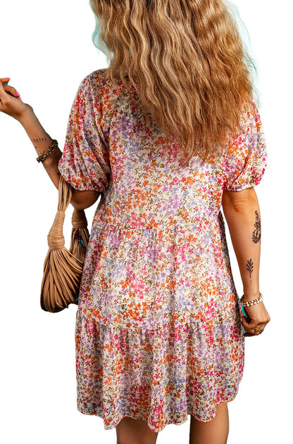Red floral puff sleeve mini dress by LuckeLadybug featuring a colorful floral pattern and a relaxed fit.
