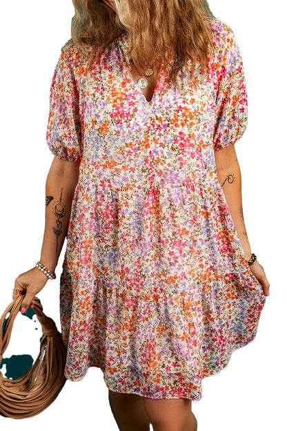 LuckeLadybug red floral puff sleeve mini dress with a playful floral pattern and tiered skirt.