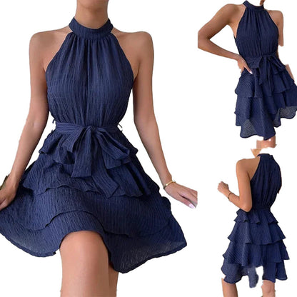 Navy blue halter mini dress for women with tiered ruffles and a bow tie belt from LuckeLadybug LLC