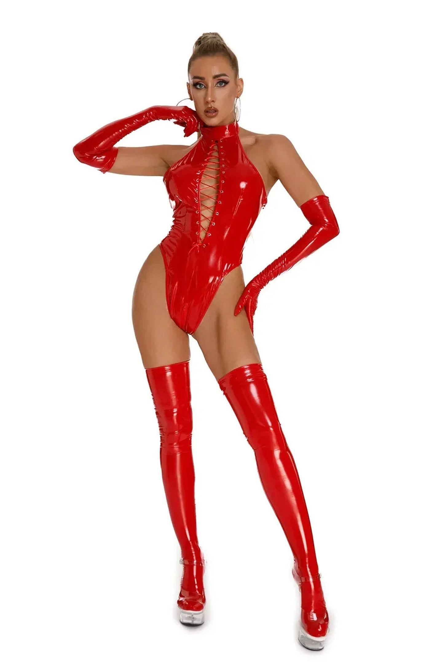 Red patent leather lingerie bodysuit with daring cutouts and matching thigh-high gloves