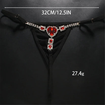 Rhinestone low rise thongs for women featuring a heart-shaped gem and elegant design