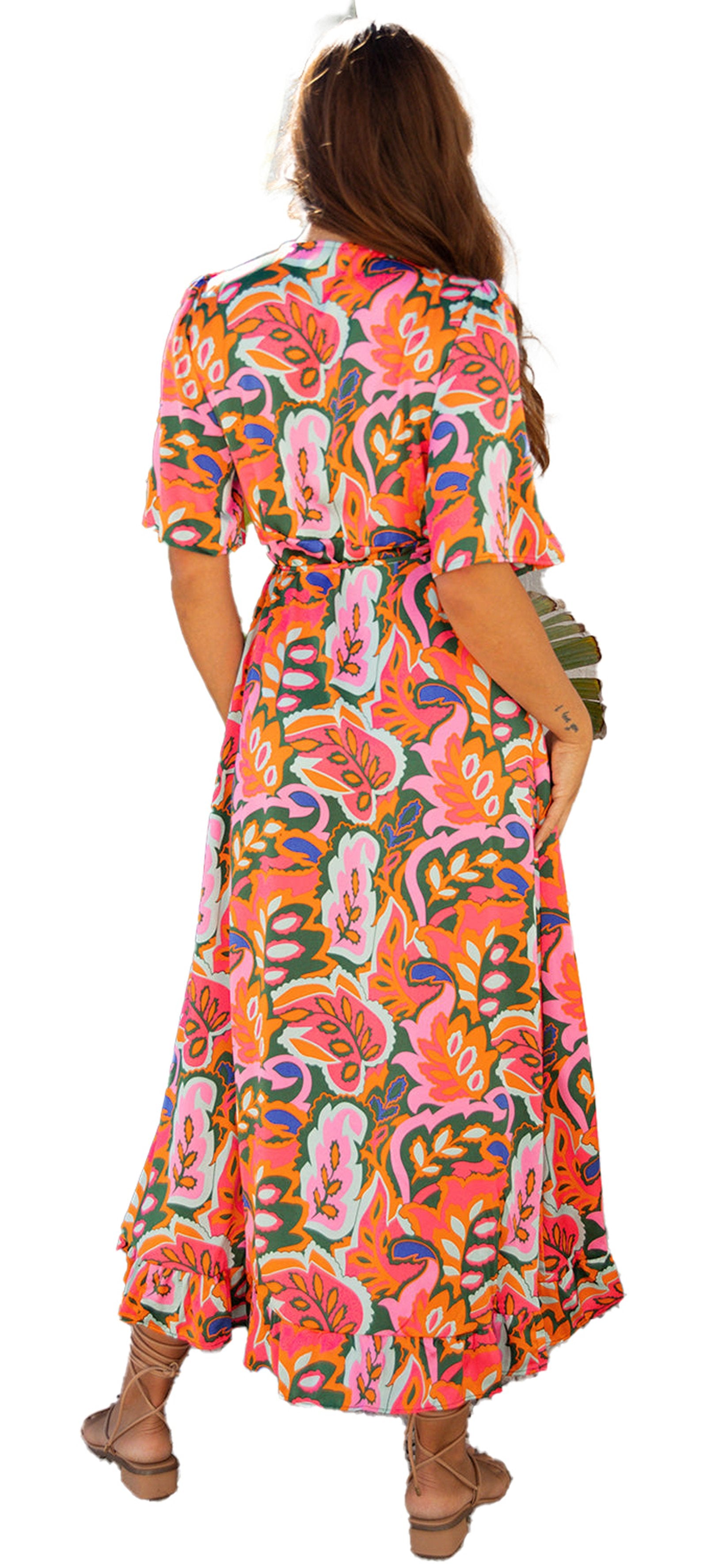 Back view of a vibrant rose print maxi dress by LuckeLadybug with colorful patterns, perfect for summer outings.