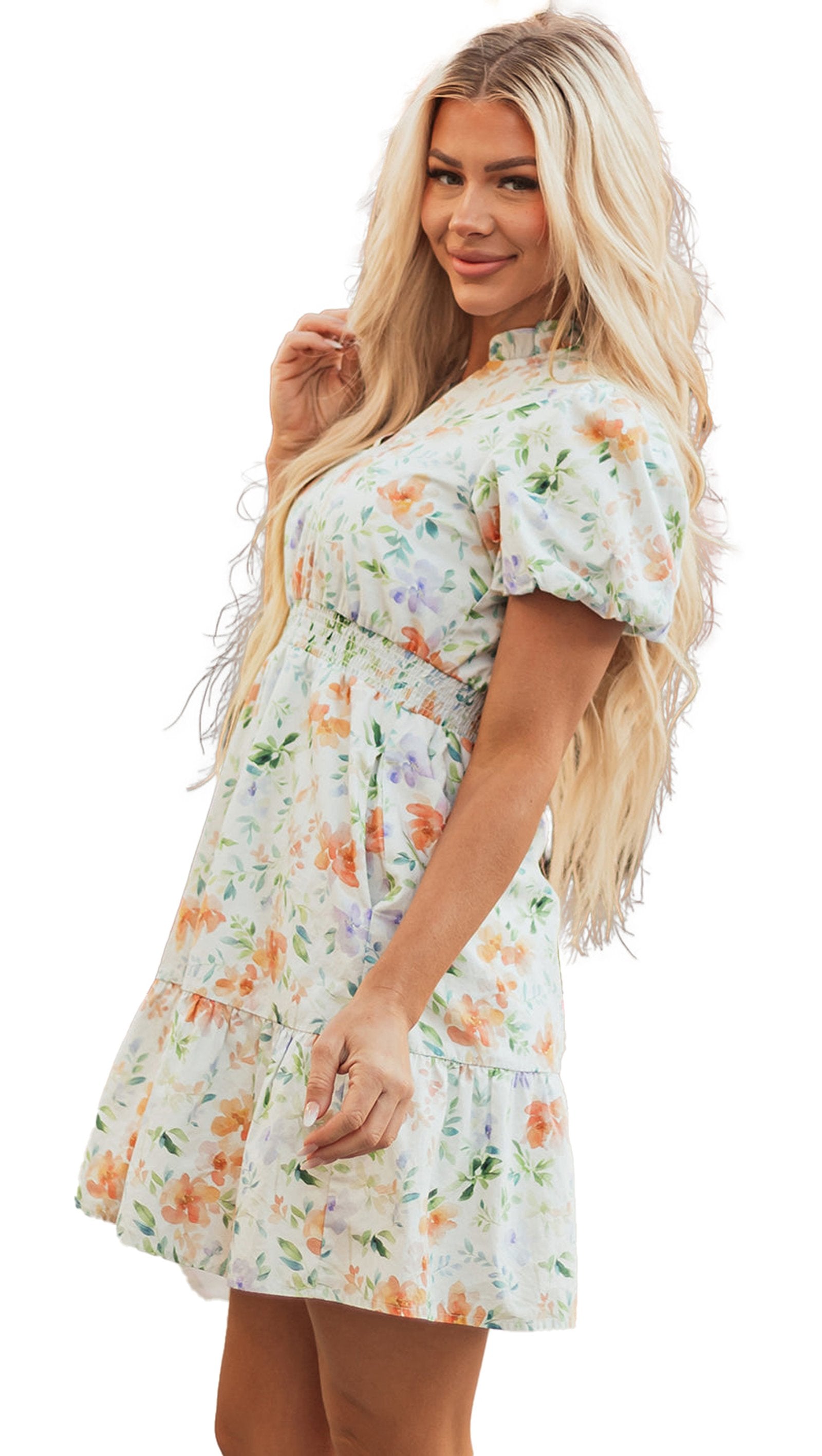 LuckeLadybug beige floral mini dress with puff sleeves smocked waist and tiered ruffle hem on model