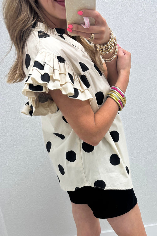 LuckeLadybug ruffle frill blouse in cream with black polka dots and ruffled sleeves