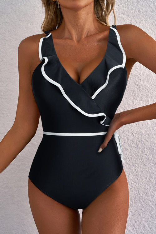 Black Ruffled Swimsuit by LuckeLadybug LLC with Elegant White Trim and V-Neck Design