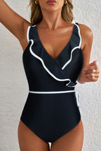LuckeLadybug LLC Black Ruffled Swimsuit with White Trim and V-Neck Design