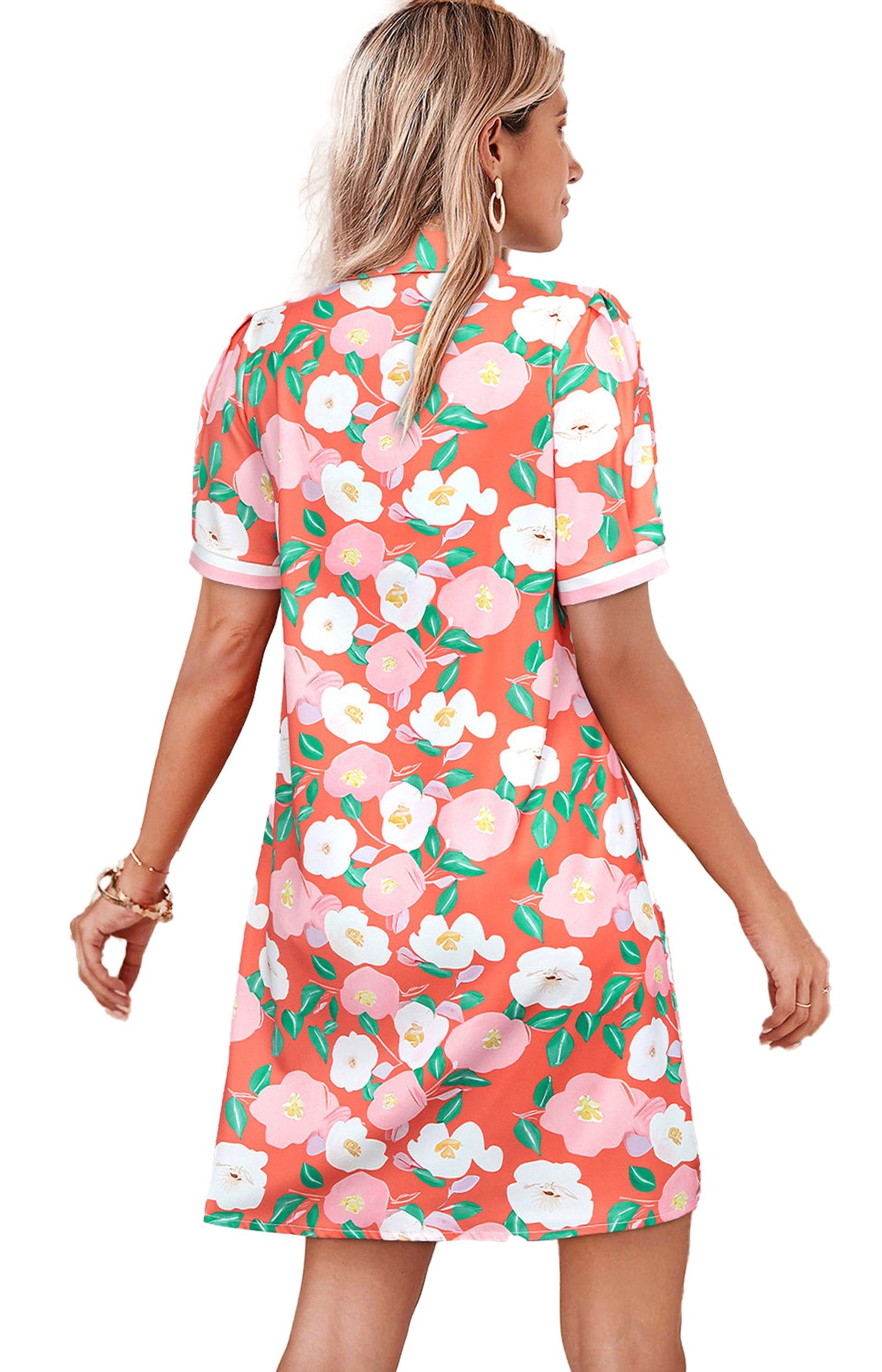 Salmon floral polo dress with vibrant flower patterns, perfect for casual outings and summer wear