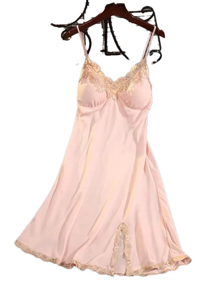 Elegant pink satin suspender nightdress for women with lace accents for a romantic look