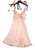 Elegant pink satin suspender nightdress for women with lace trim and adjustable straps