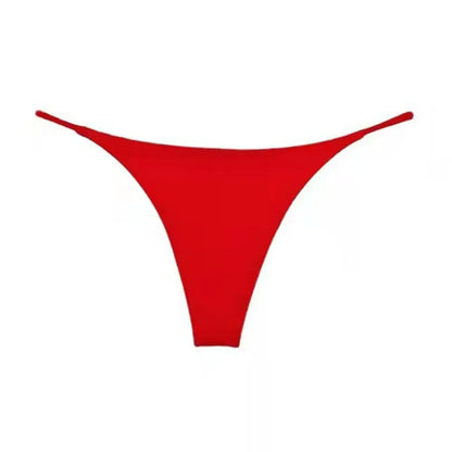 Bright red seamless thong panties for women from LuckeLadybug LLC, offering comfort and a sleek fit