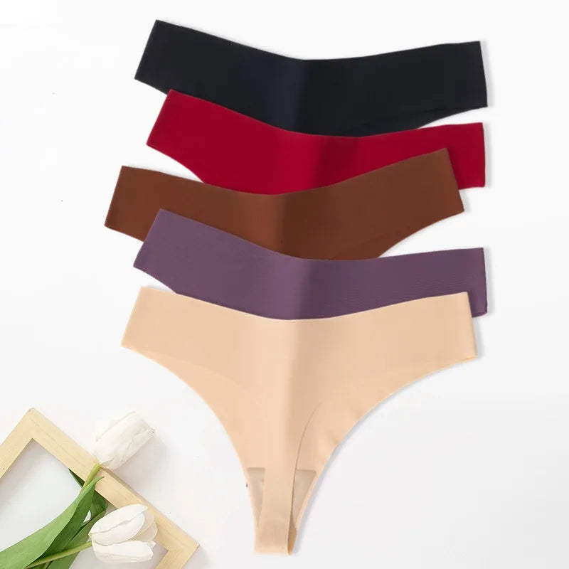 Set of seamless thongs for women in various colors including black, red, beige, and brown