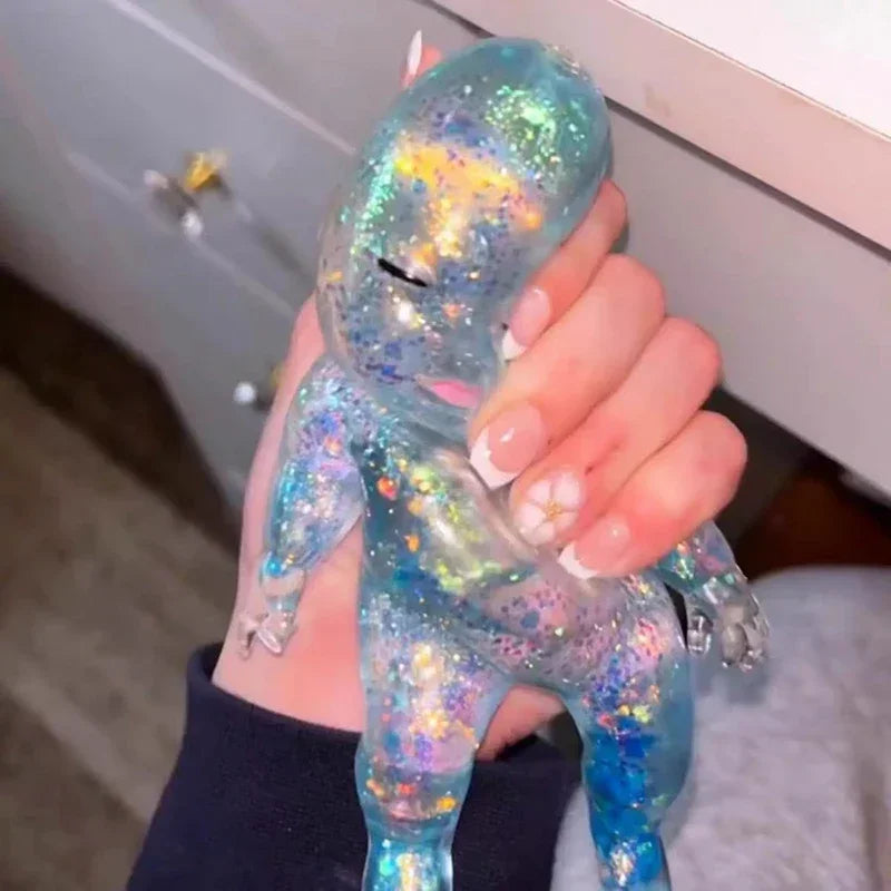 LuckeLadybug sparkly squishy sensory fidget toy shaped like a cute baby figure