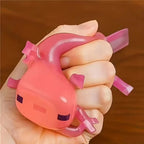 LuckeLadybug sensory fidget toy in pink, designed for stress relief and tactile fun