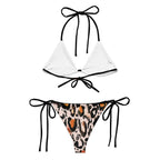 LuckeLadybug sexy animal print swimwear featuring a stylish white top and bold leopard print bottom