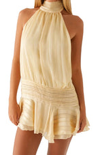 LuckeLadybug LLC sexy halter mini dress in soft beige with a flared hem and elegant draping