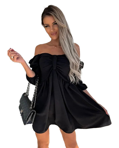 Sexy off shoulder mini dress in black with a bow detail, perfect for trendy outings or casual wear