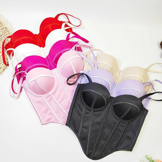 Variety of sexy red corset tops for women in different colors with adjustable straps