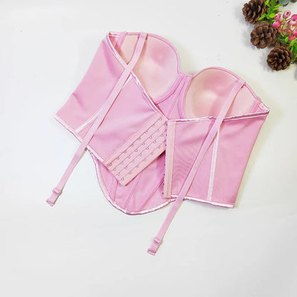 Pink corset top in a structured design, ideal for layering, featuring adjustable straps and hooks, sexy red corset top for women.