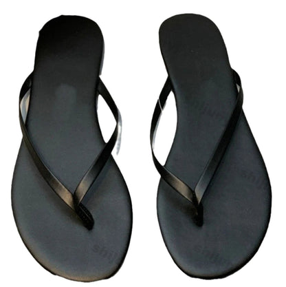 LuckeLadybug LLC women's comfortable flip flops in black with sleek design for everyday wear