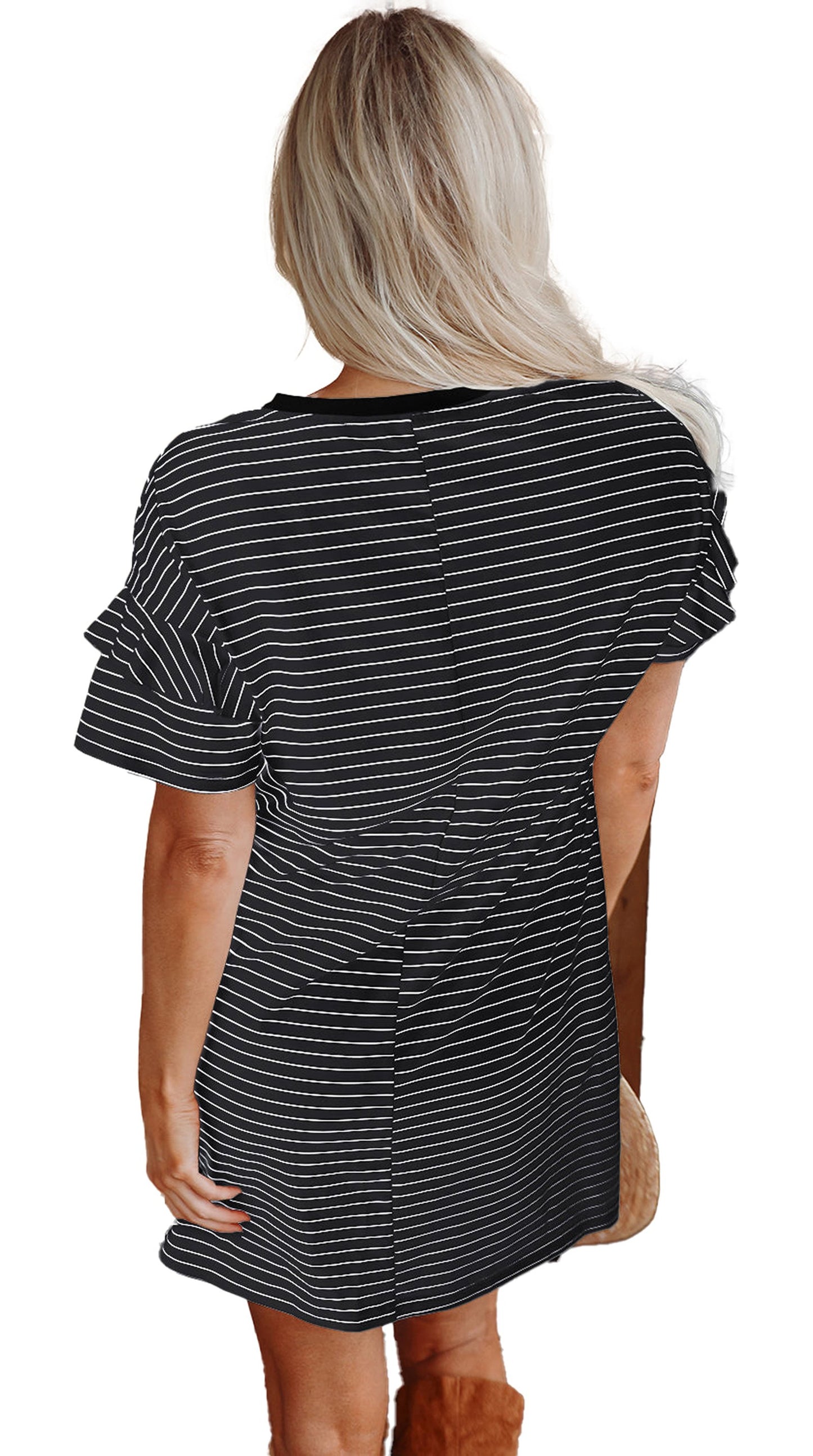Back view of woman in black stripe ruffle mini dress with short ruffle sleeves and relaxed H line fit