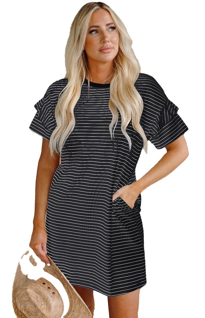 LuckeLadybug H Line model wearing a black stripe ruffle mini dress with pockets holding straw hat