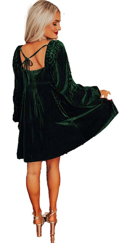LuckeLadybug holiday display showing model in green velvet mini dress similar to black velvet babydoll dress