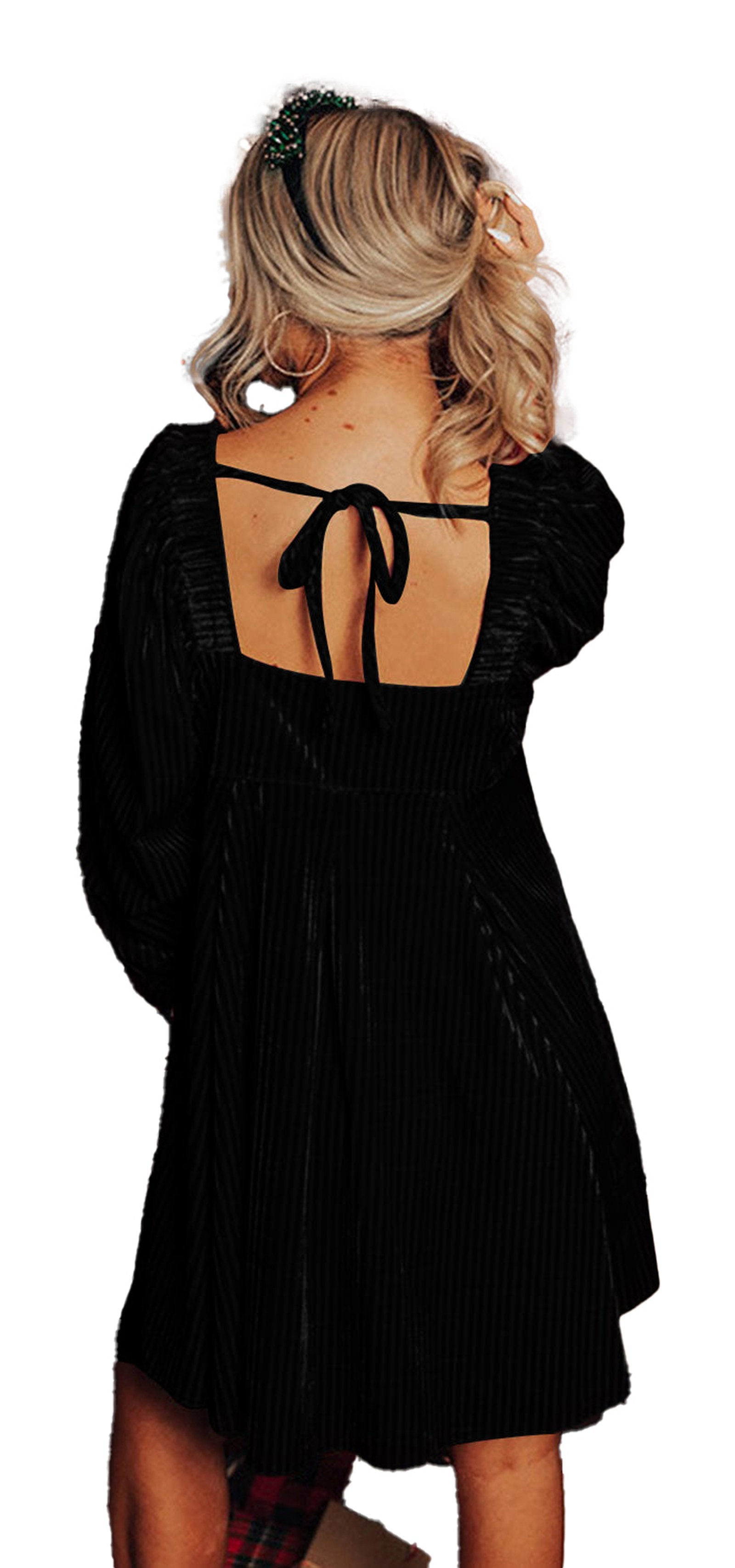 Back view of woman in LuckeLadybug black velvet babydoll dress with square open back bow and puff sleeves