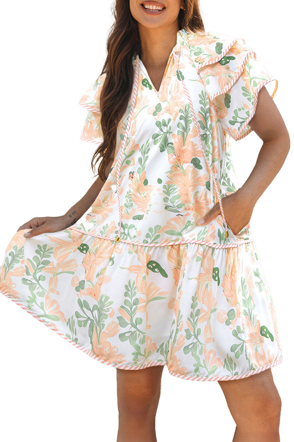 Woman wearing Dear Lover Dropshipping sky blue floral mini dress with ruffled sleeves and tiered skirt