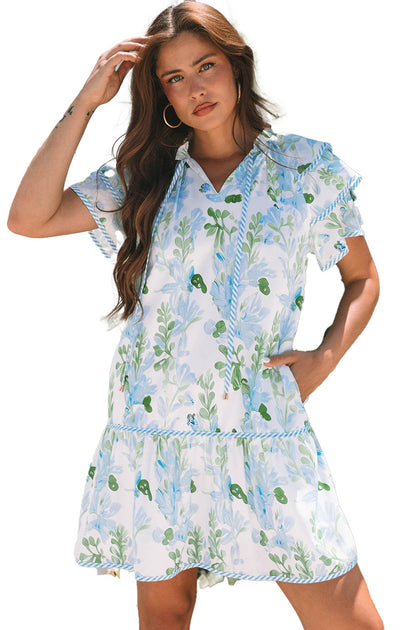 Dear Lover Dropshipping sky blue floral mini dress with ruffle sleeves and V neck model outdoors